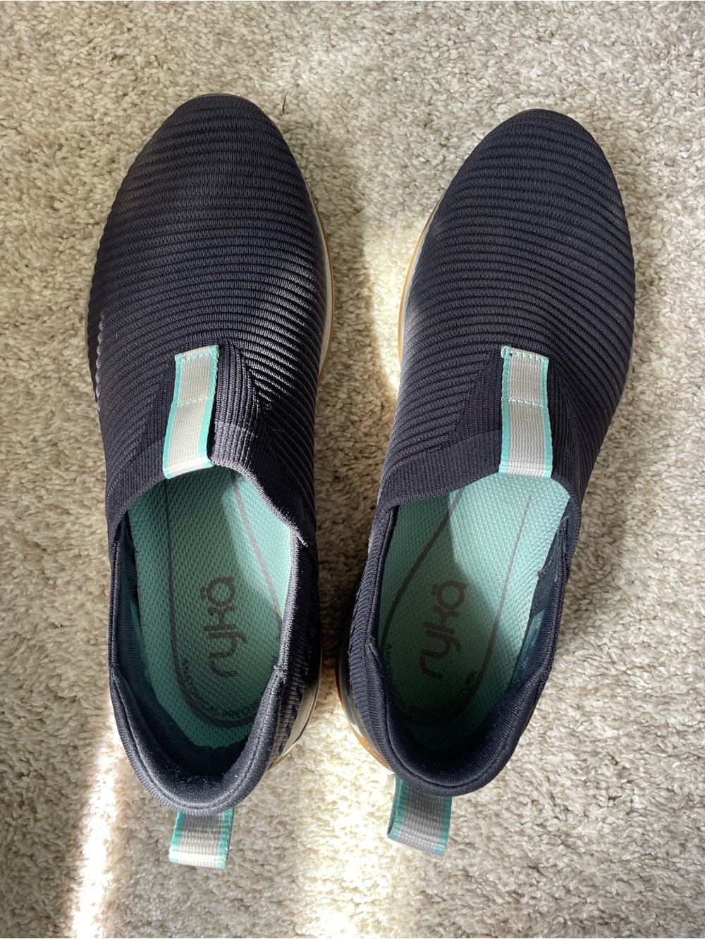 Ryka Black Slip-On Sneakers with Mint Interior Accents